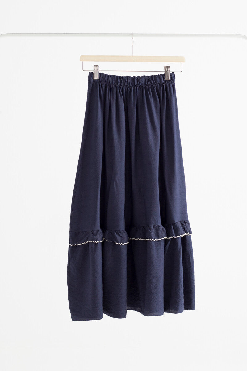 Mónica black pleated midi skirt