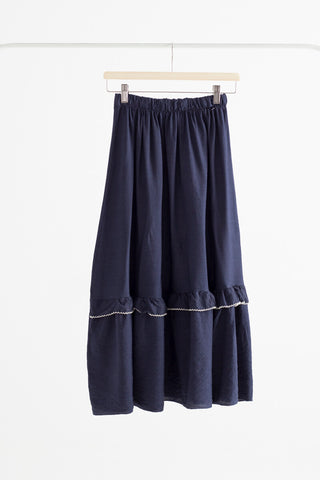 Mónica black pleated midi skirt