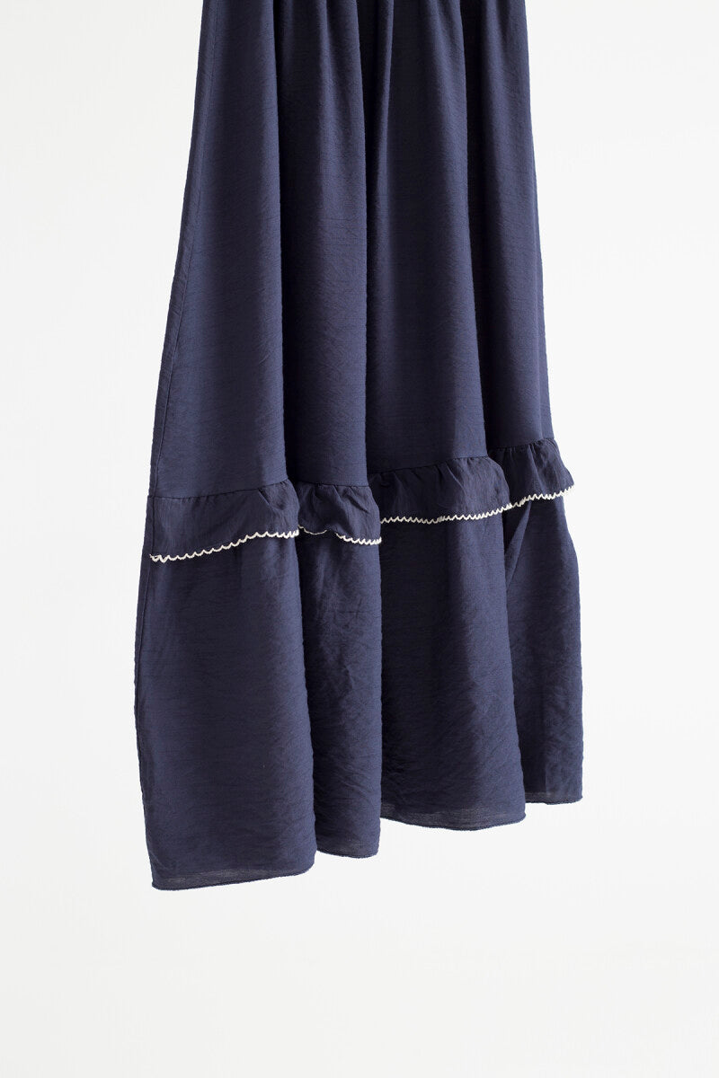 Mónica black pleated midi skirt