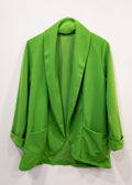 Blazer fluida verde Césped
